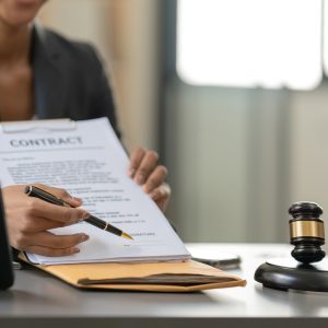 Woman lawyer working on a laptop. Legal law, advice and justice concept